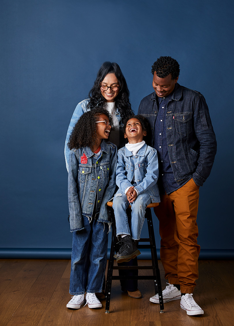 Family of four, laughing together